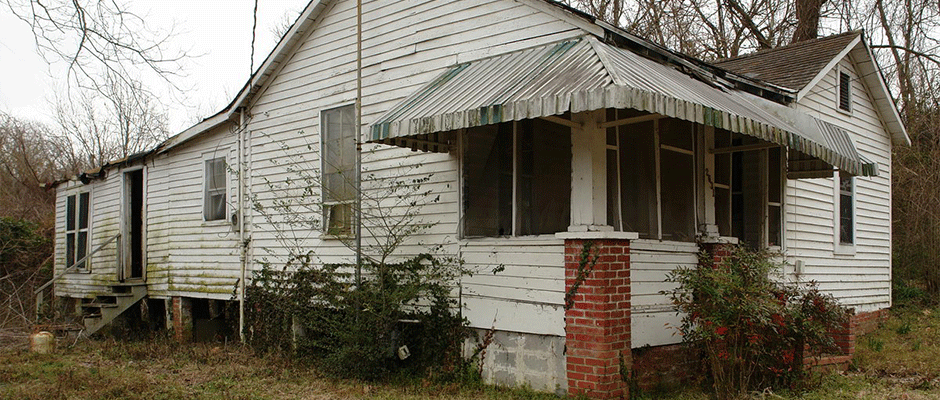 House in poor condition, rundown home.